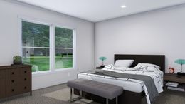 The LOVELY DAY Exterior. This Manufactured Mobile Home features 4 bedrooms and 2 baths.
