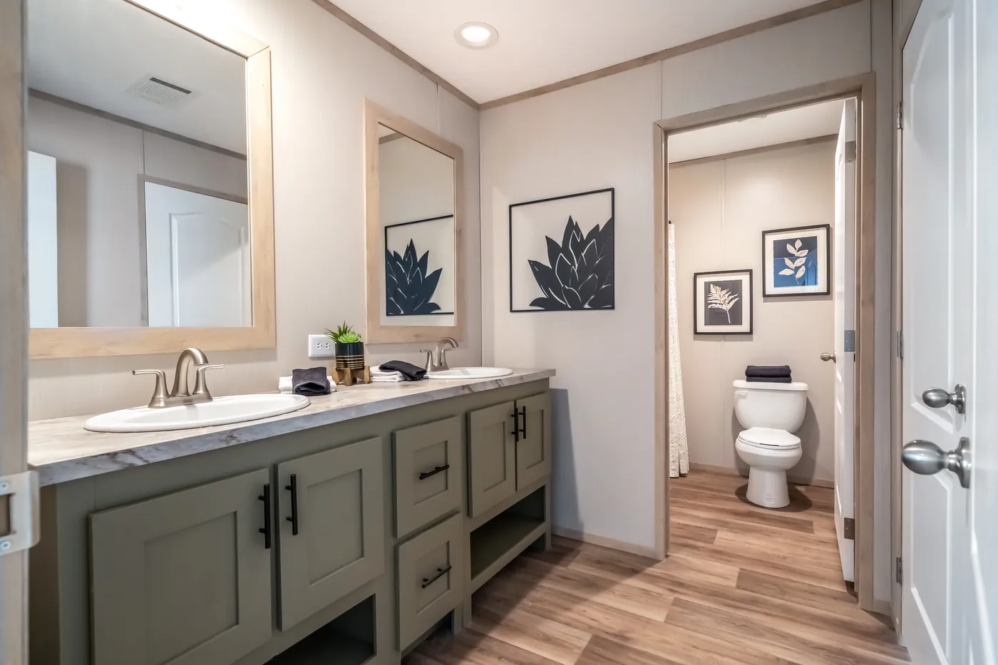 The RAINIER Exterior. This Manufactured Mobile Home features 4 bedrooms and 3 baths.