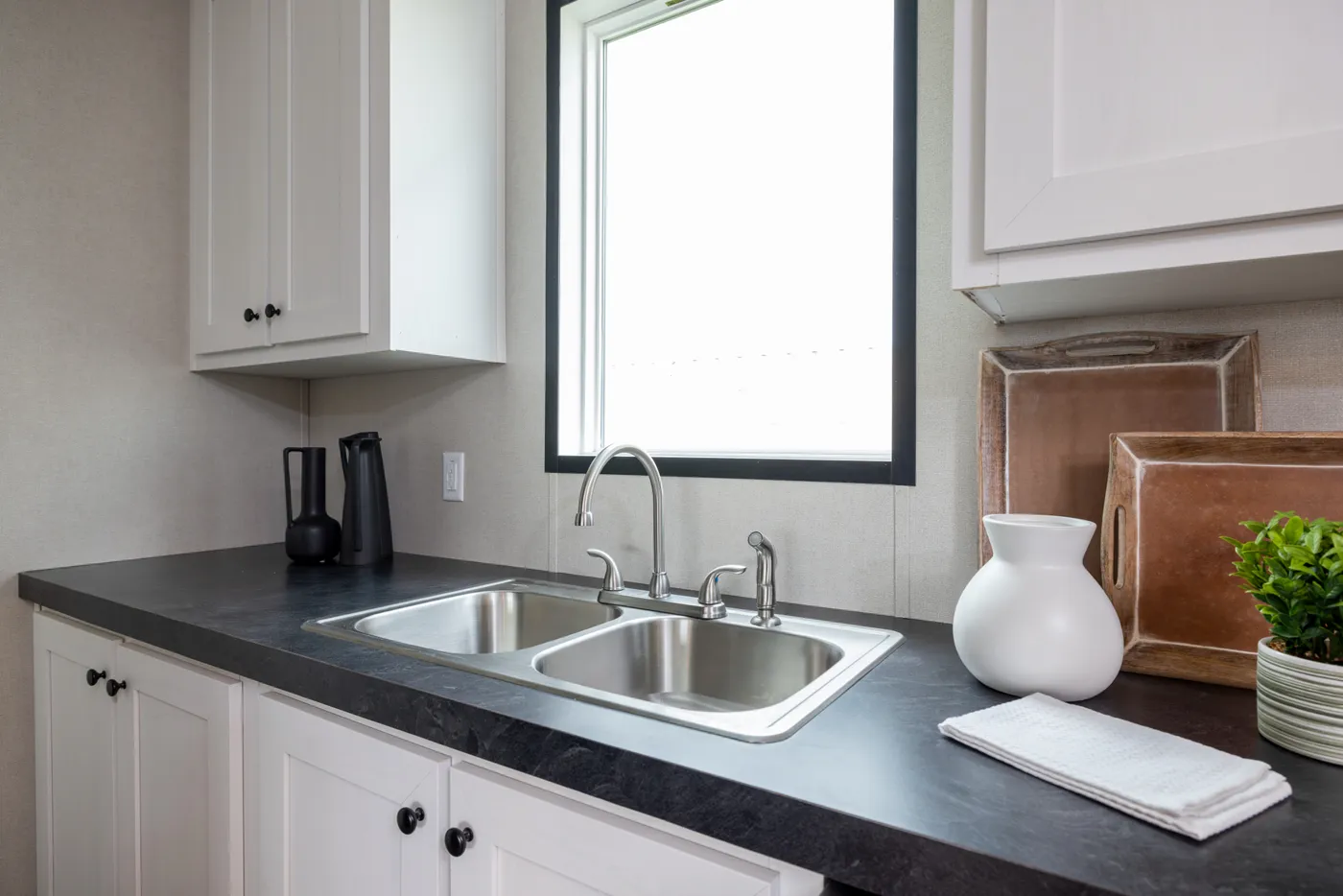 The PLATINUM ANNIVERSARY Exterior. This Manufactured Mobile Home features 3 bedrooms and 2 baths.