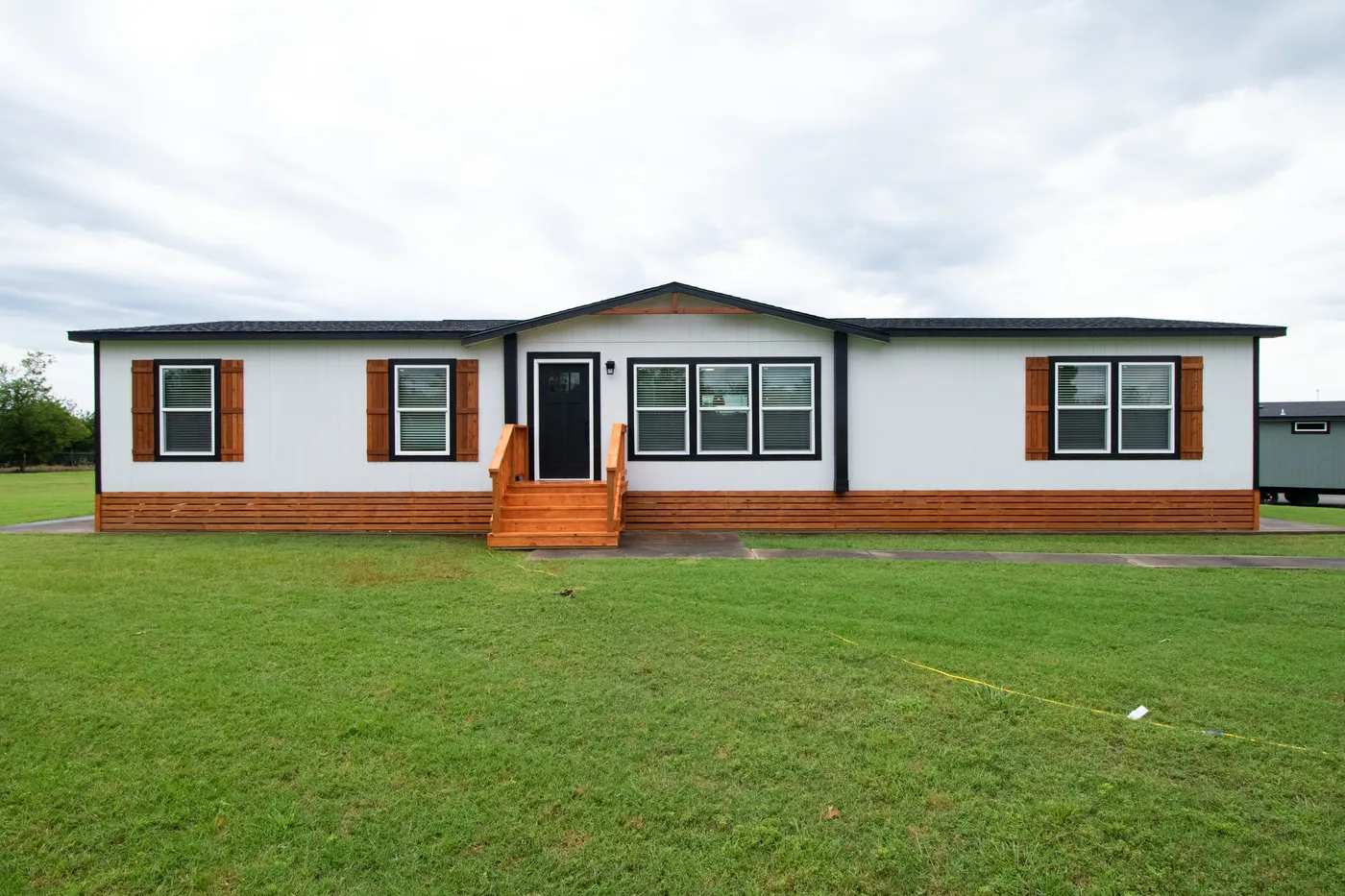 The ODYSSEY Exterior. This Manufactured Mobile Home features 4 bedrooms and 2 baths.