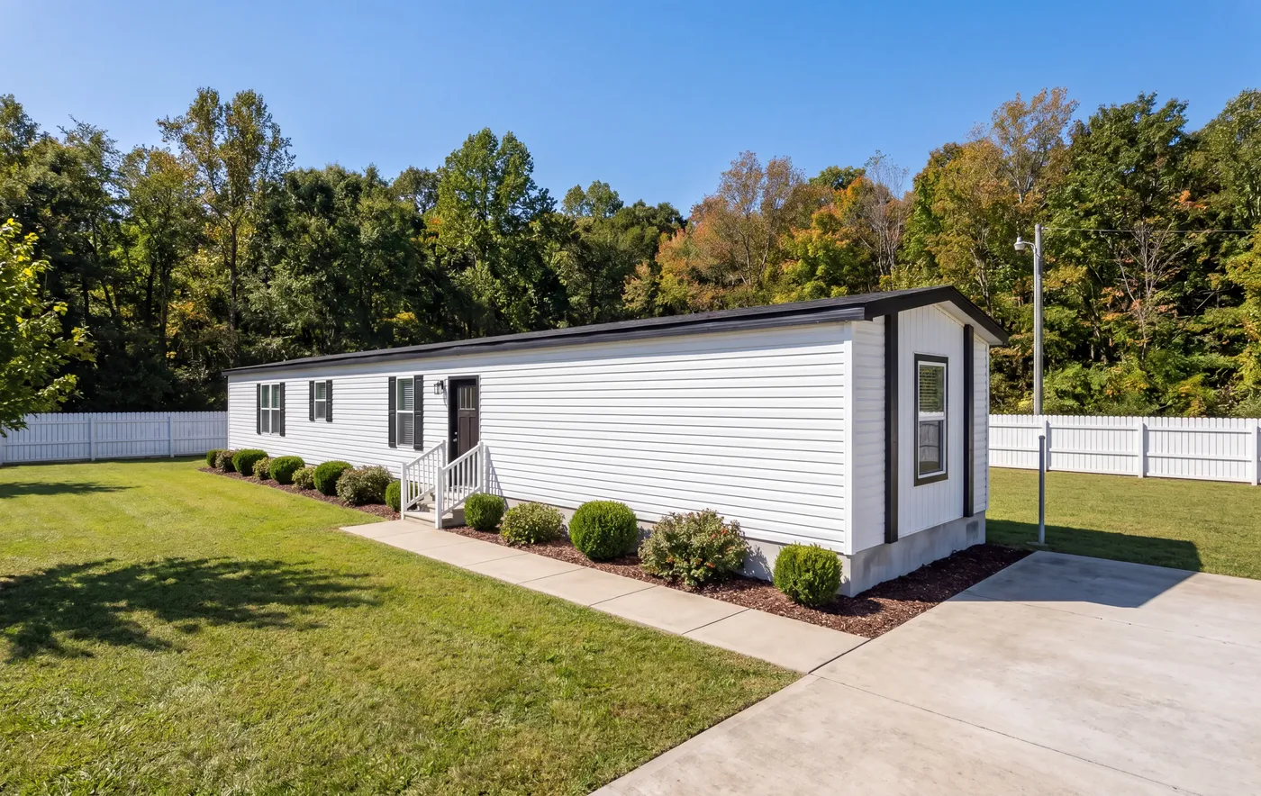 The ANNIVERSARY 76 Exterior. This Manufactured Mobile Home features 3 bedrooms and 2 baths.