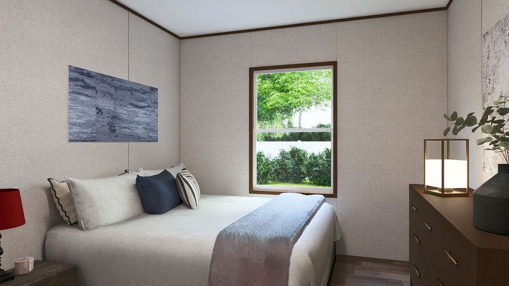 The CEDAR Exterior. This Manufactured Mobile Home features 3 bedrooms and 2 baths.