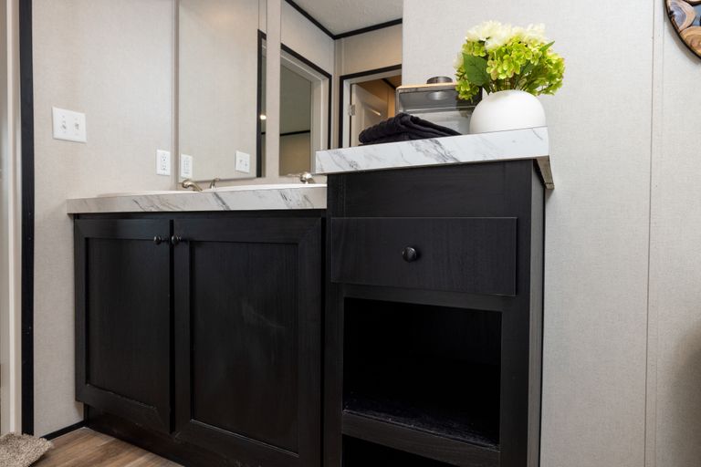 The PLATINUM ANNIVERSARY Exterior. This Manufactured Mobile Home features 3 bedrooms and 2 baths.