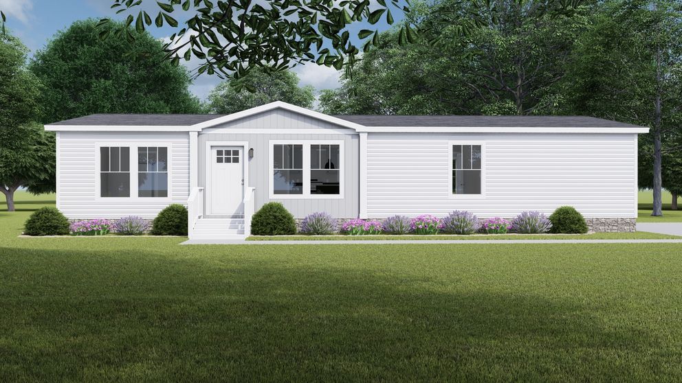 The LET IT BE Exterior. This Manufactured Mobile Home features 3 bedrooms and 2 baths.