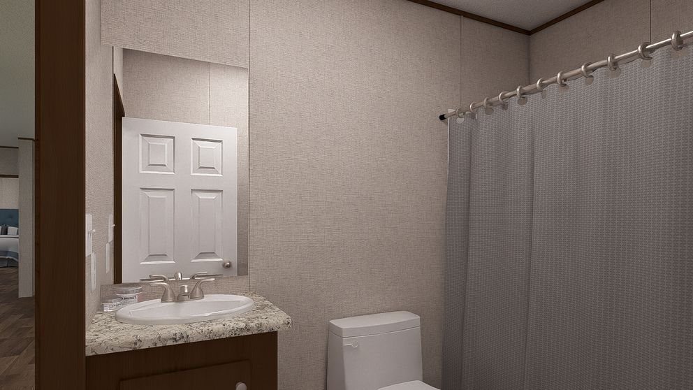 The SPRUCE Exterior. This Manufactured Mobile Home features 3 bedrooms and 2 baths.