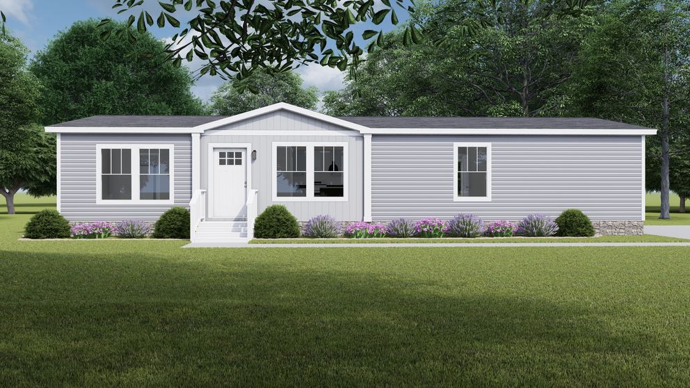 The LET IT BE Exterior. This Manufactured Mobile Home features 3 bedrooms and 2 baths.