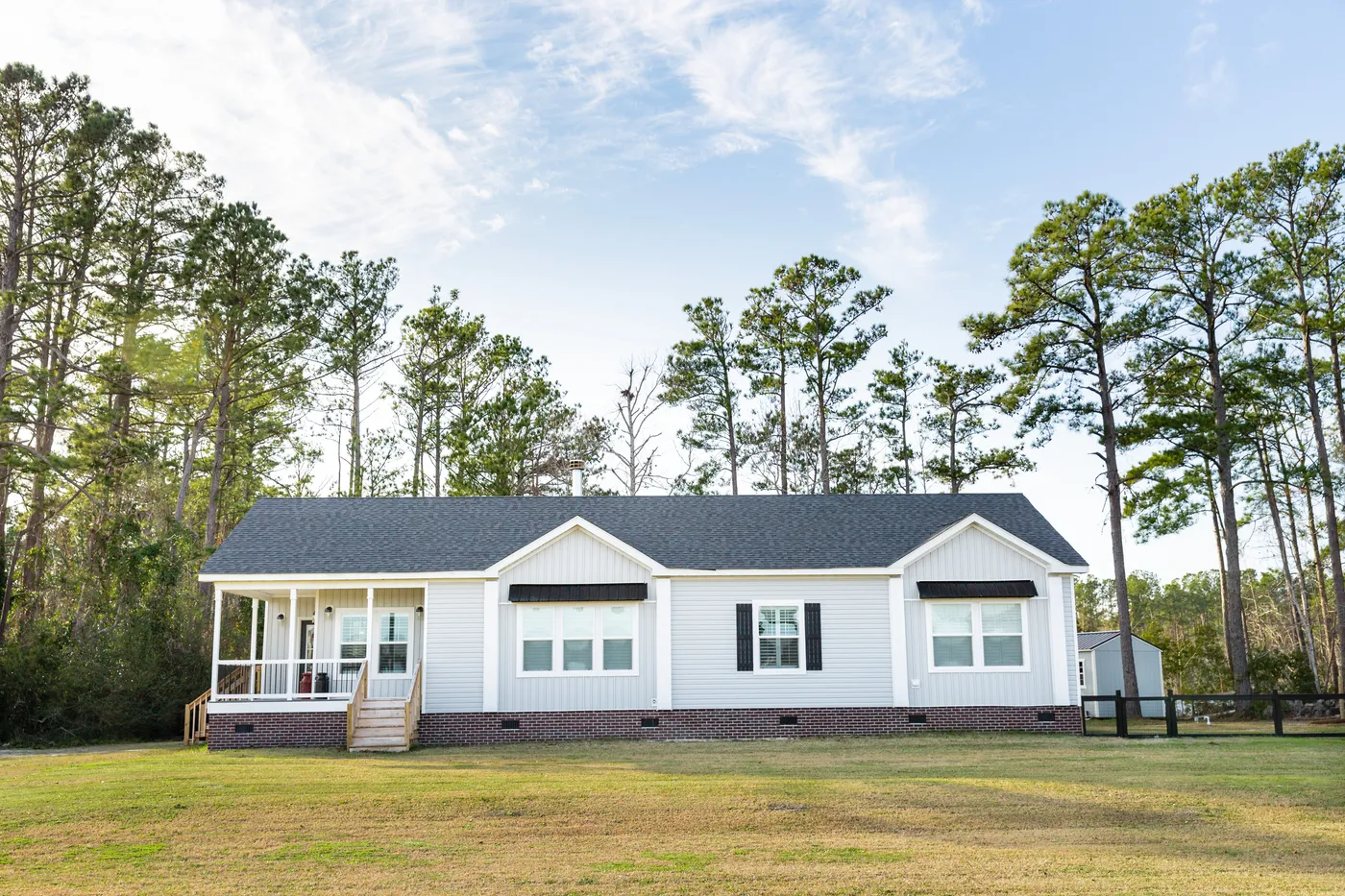 The 1434 CAROLINA "SOUTHERN BELLE" Exterior. This Manufactured Mobile Home features 3 bedrooms and 2 baths.