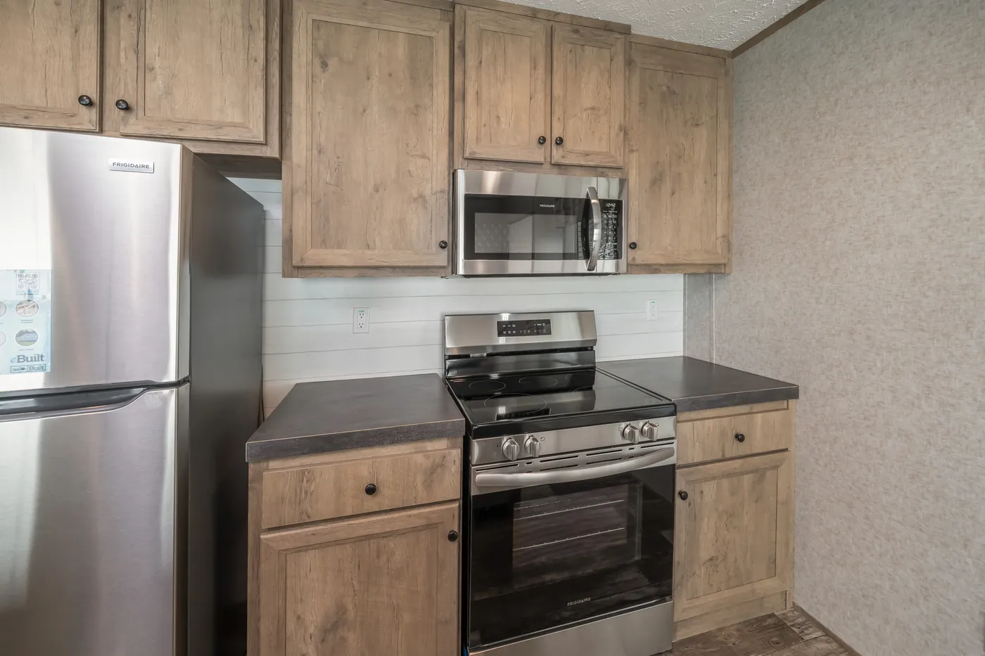 The LAKESIDE COTTAGE Exterior. This Manufactured Mobile Home features 1 bedroom and 1 bath.