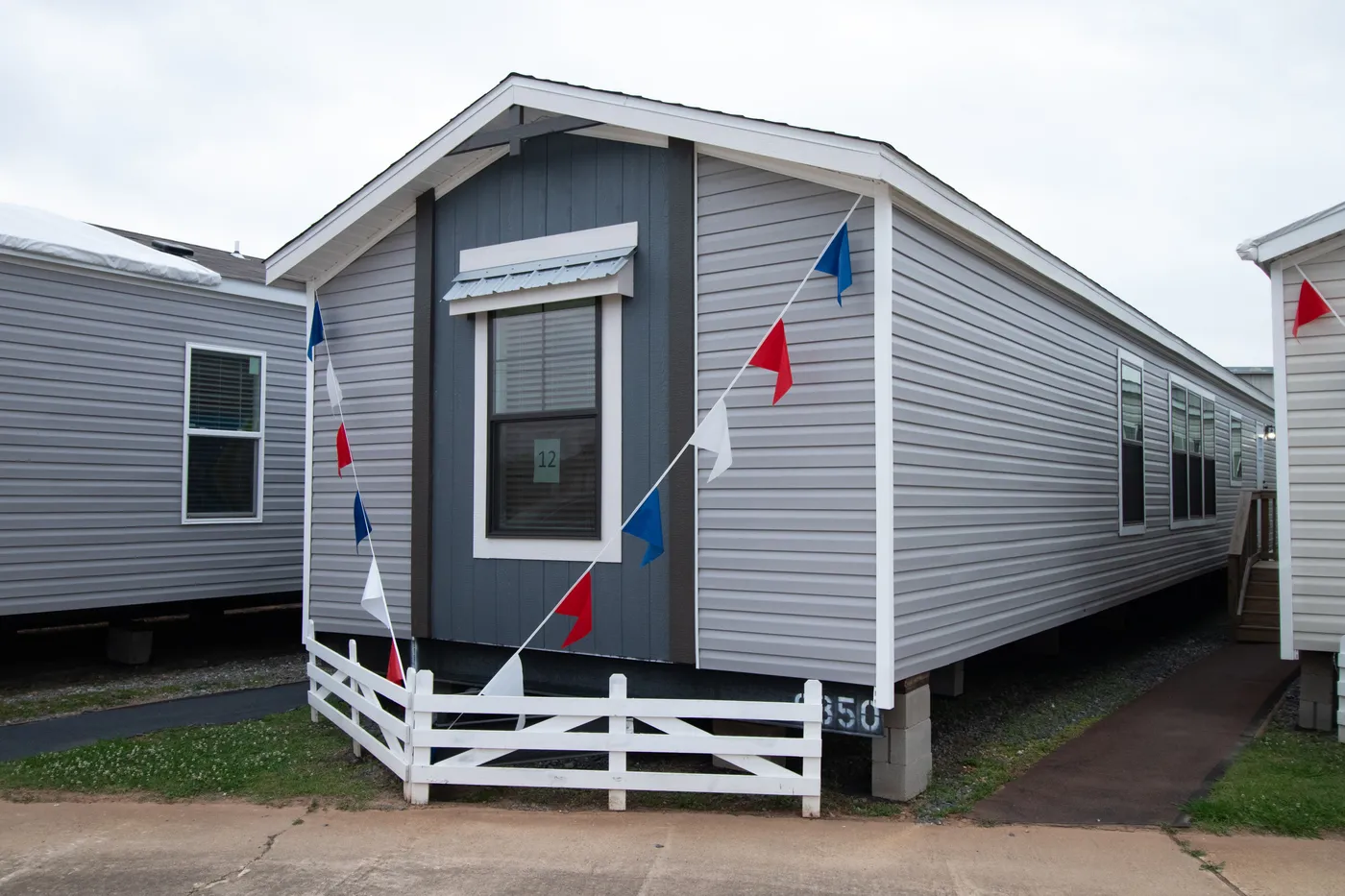 The LEXI Exterior. This Manufactured Mobile Home features 3 bedrooms and 2 baths.