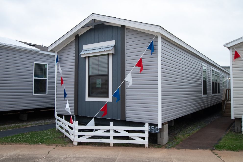 The LEXI Exterior. This Manufactured Mobile Home features 3 bedrooms and 2 baths.
