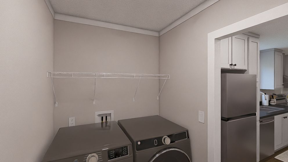The WONDERFUL WORLD Exterior. This Manufactured Mobile Home features 3 bedrooms and 2 baths.