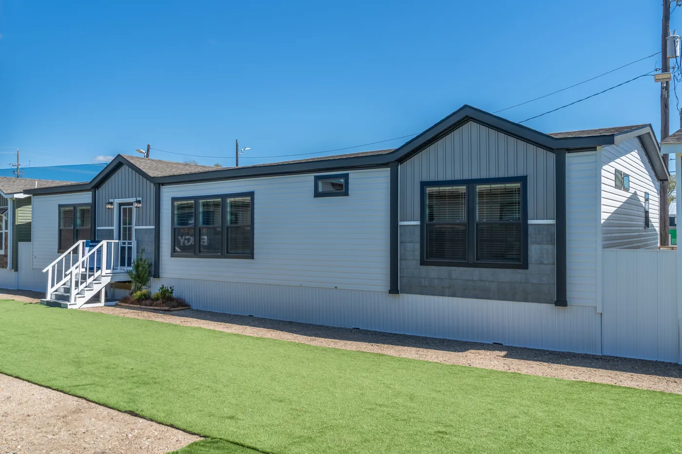 The THE REED Exterior. This Manufactured Mobile Home features 3 bedrooms and 2 baths.