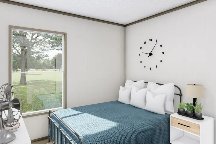 The COOK Exterior. This Manufactured Mobile Home features 3 bedrooms and 2 baths.