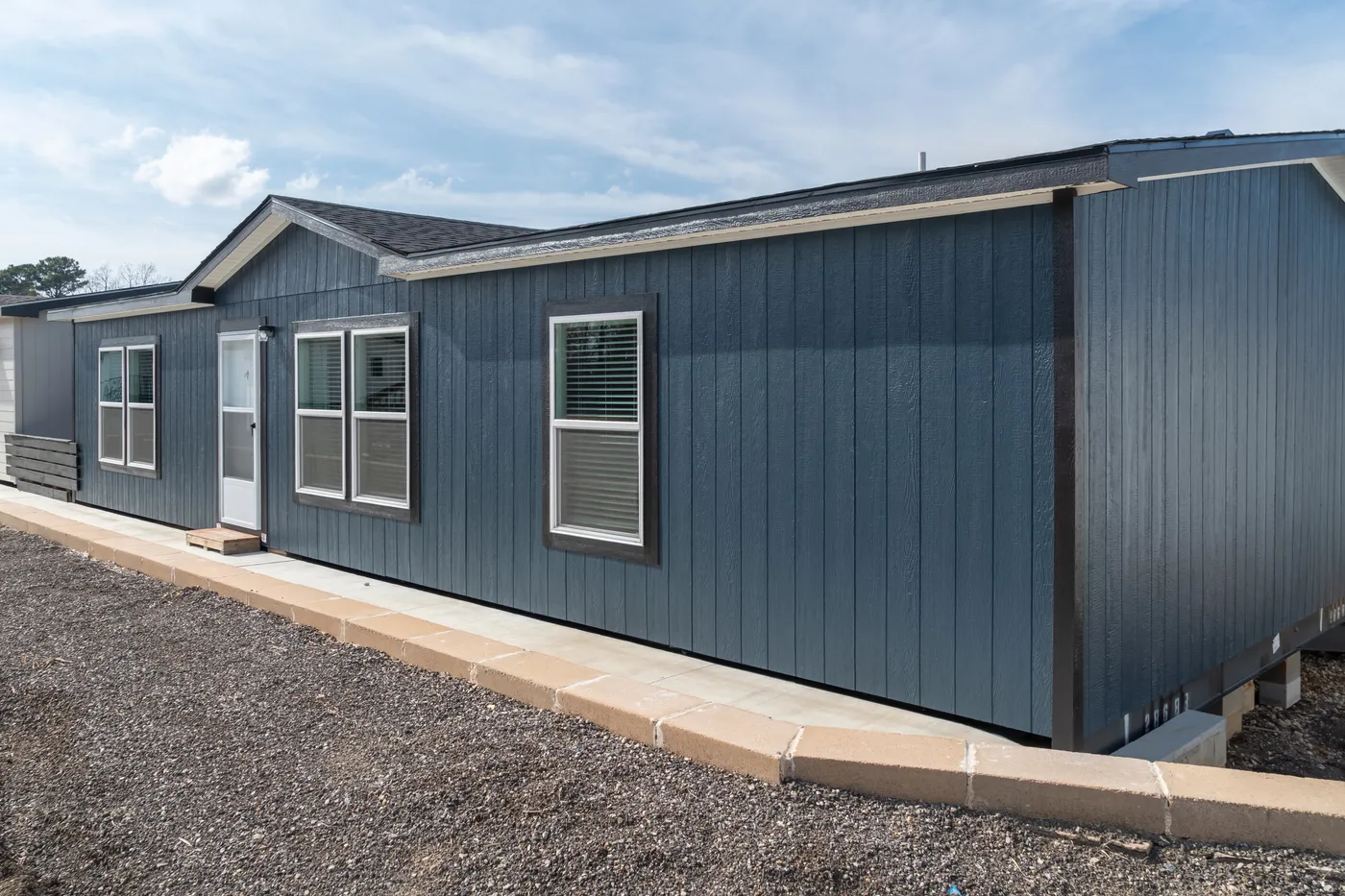 The ECLIPSE Exterior. This Manufactured Mobile Home features 4 bedrooms and 2 baths.