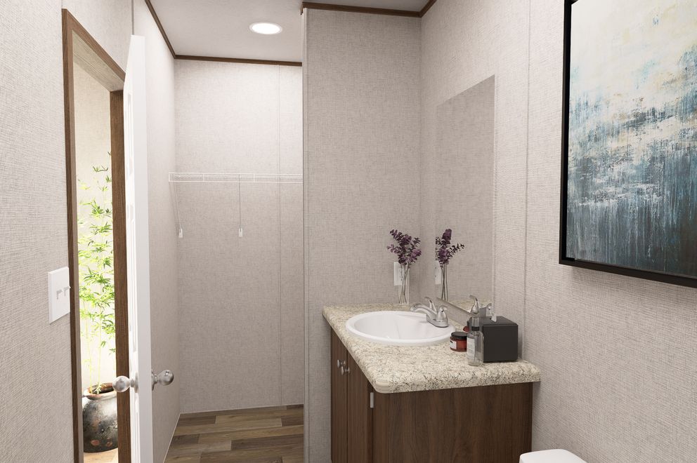 The DOGWOOD Exterior. This Manufactured Mobile Home features 2 bedrooms and 2 baths.