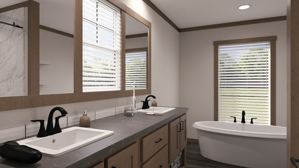 The NELLIE Exterior. This Manufactured Mobile Home features 4 bedrooms and 2 baths.
