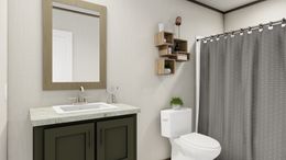 The EVEREST Exterior. This Manufactured Mobile Home features 4 bedrooms and 2 baths.