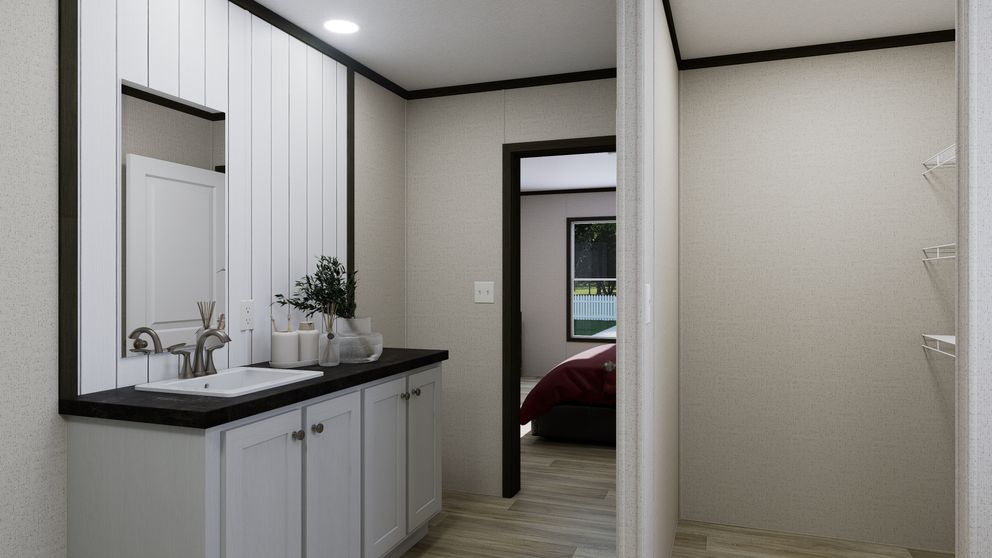 The PURPOSE Exterior. This Manufactured Mobile Home features 4 bedrooms and 2 baths.
