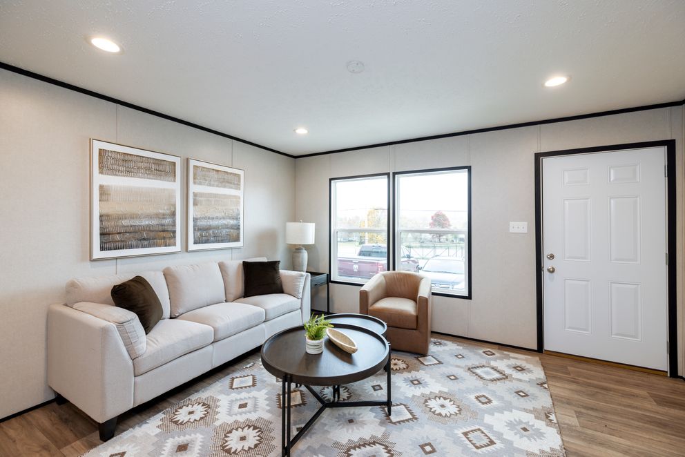 The PLATINUM ANNIVERSARY Exterior. This Manufactured Mobile Home features 3 bedrooms and 2 baths.