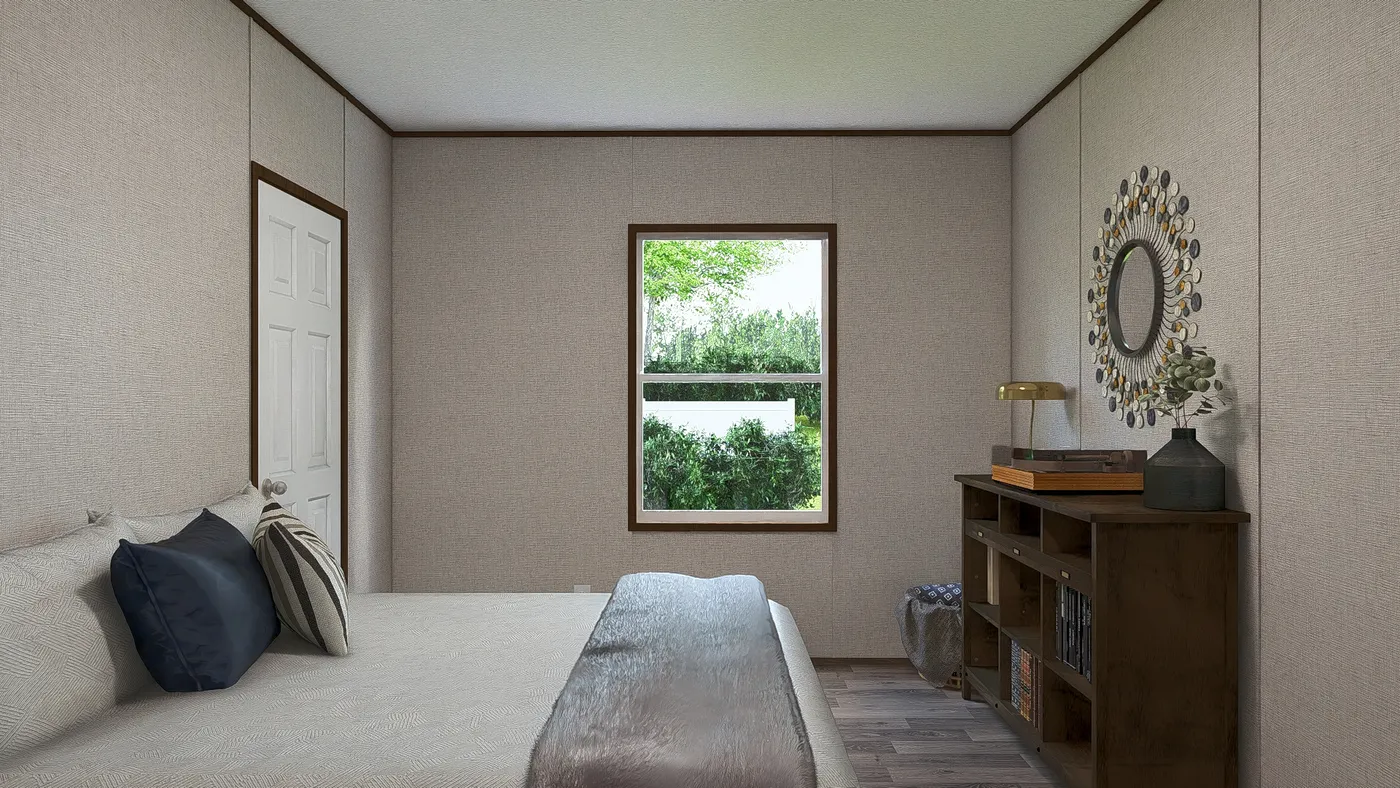 The SPRUCE Exterior. This Manufactured Mobile Home features 3 bedrooms and 2 baths.