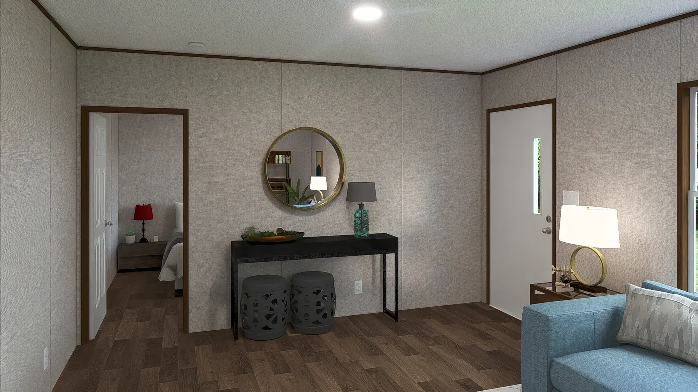 The SPRUCE Exterior. This Manufactured Mobile Home features 3 bedrooms and 2 baths.