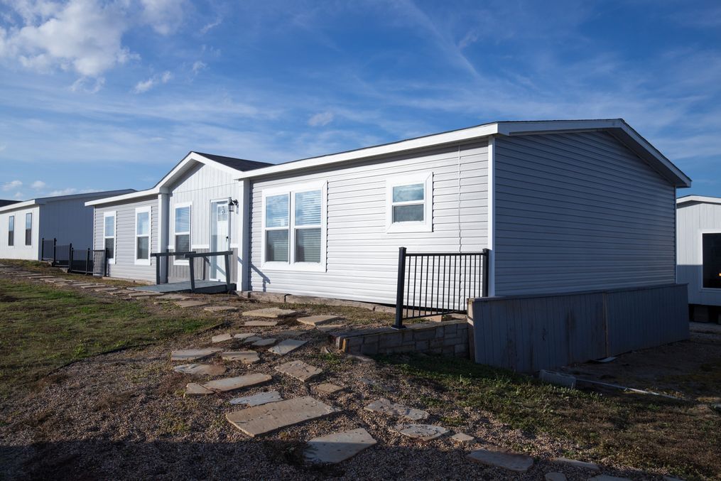 The BREEZE FARMHOUSE Exterior. This Manufactured Mobile Home features 3 bedrooms and 2 baths.