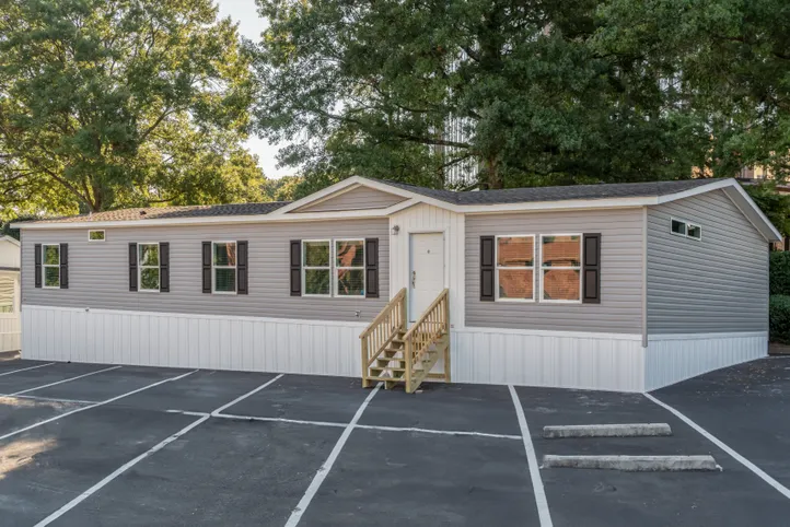 The LOCKLEAR Exterior. This Manufactured Mobile Home features 4 bedrooms and 2 baths.