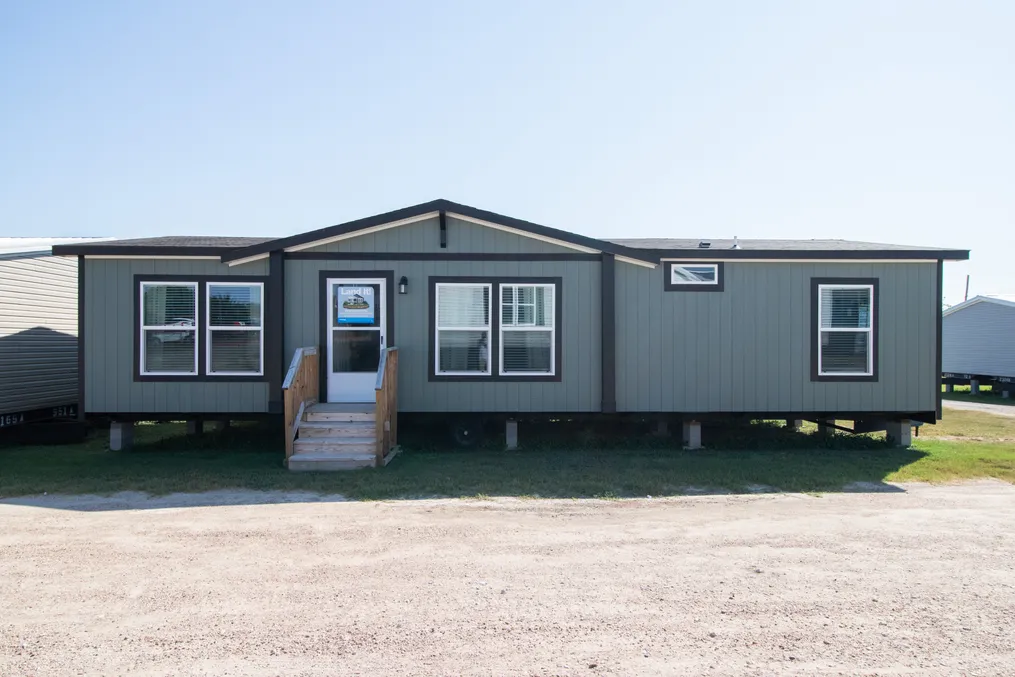 The THE RENEGADE Exterior. This Manufactured Mobile Home features 3 bedrooms and 2 baths.