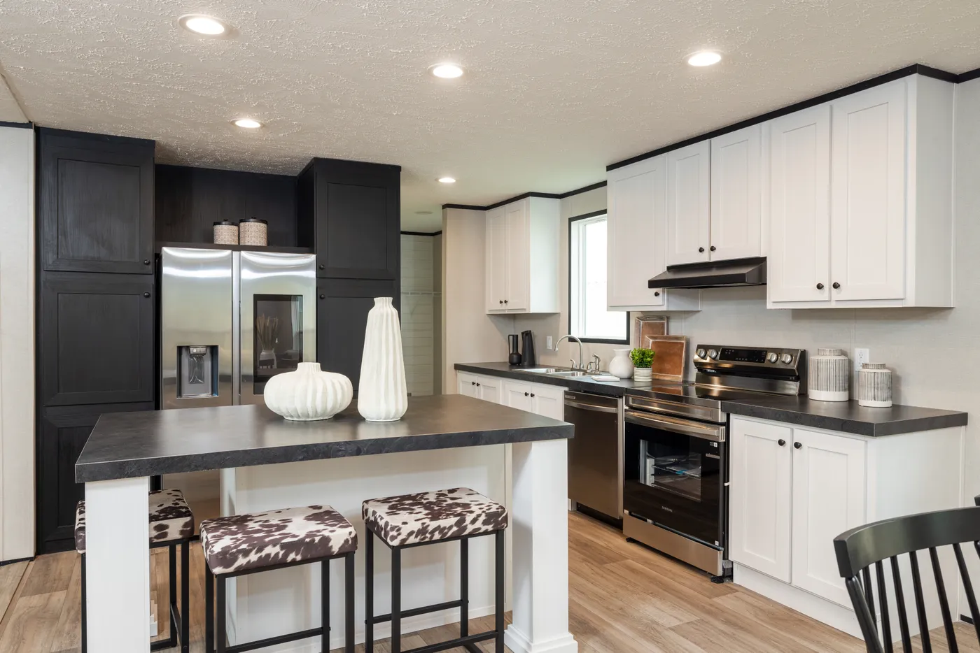 The PLATINUM ANNIVERSARY Exterior. This Manufactured Mobile Home features 3 bedrooms and 2 baths.