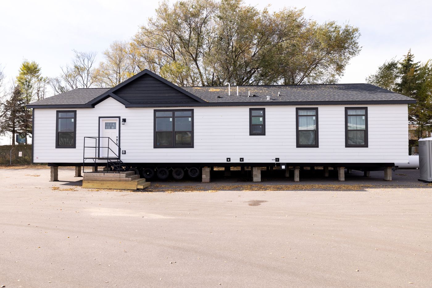 The 50TH ANNIVERSARY Exterior. This Manufactured Mobile Home features 3 bedrooms and 2 baths.