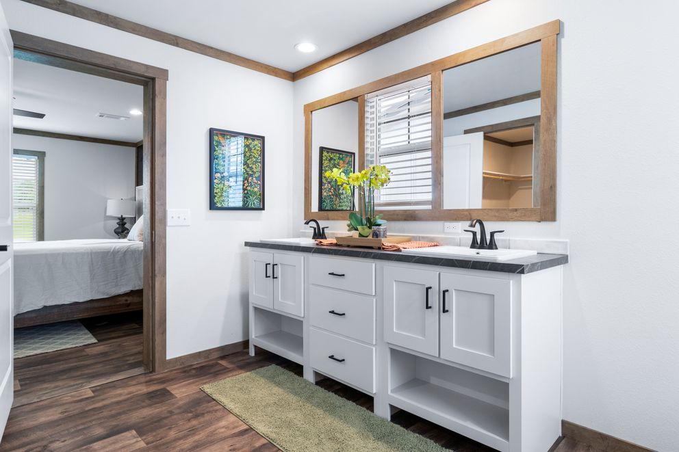 The FARM 3 FLEX ELITE DEN Exterior. This Manufactured Mobile Home features 3 bedrooms and 2 baths.