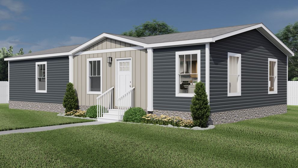 The UNDER PRESSURE Exterior. This Manufactured Mobile Home features 3 bedrooms and 2 baths.