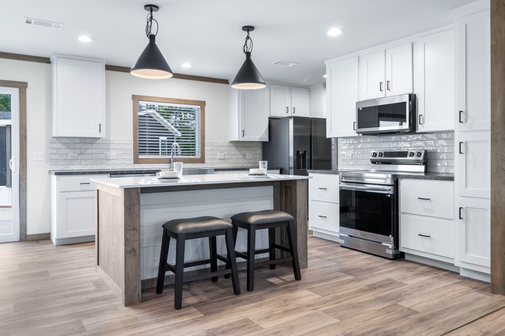The EMILIE ELITE Exterior. This Manufactured Mobile Home features 3 bedrooms and 2 baths.