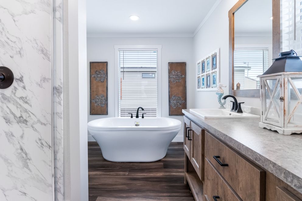 The LIZZIE Exterior. This Manufactured Mobile Home features 3 bedrooms and 2 baths.