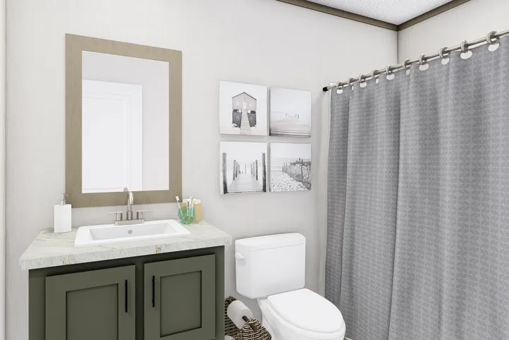 The COOK Exterior. This Manufactured Mobile Home features 3 bedrooms and 2 baths.