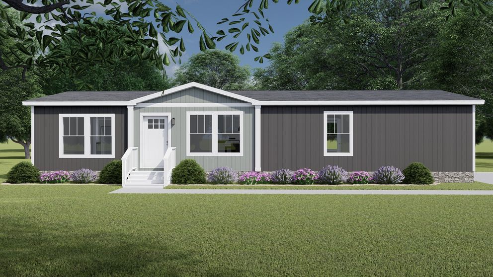 The LET IT BE Exterior. This Manufactured Mobile Home features 3 bedrooms and 2 baths.