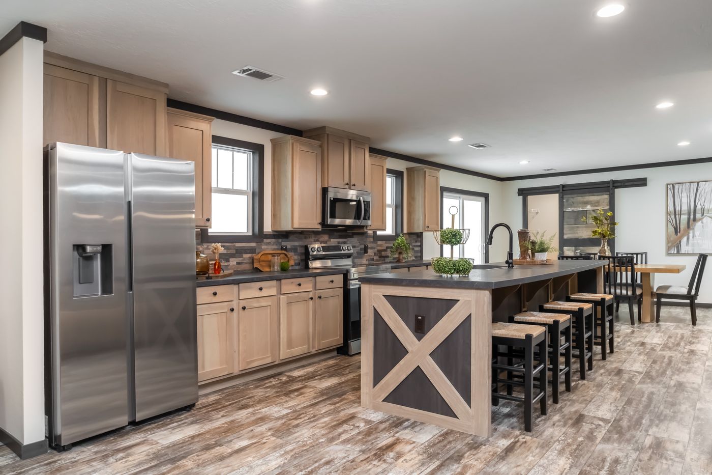 The BOUJEE LUX Exterior. This Manufactured Mobile Home features 4 bedrooms and 3 baths.