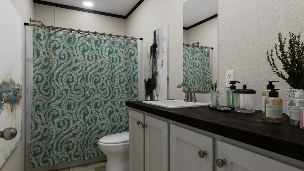 The PURPOSE Exterior. This Manufactured Mobile Home features 4 bedrooms and 2 baths.