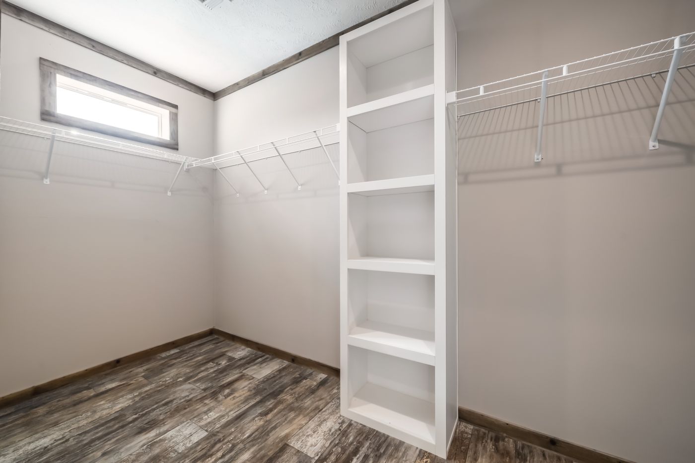 The THE TYRA II Exterior. This Manufactured Mobile Home features 4 bedrooms and 2 baths.
