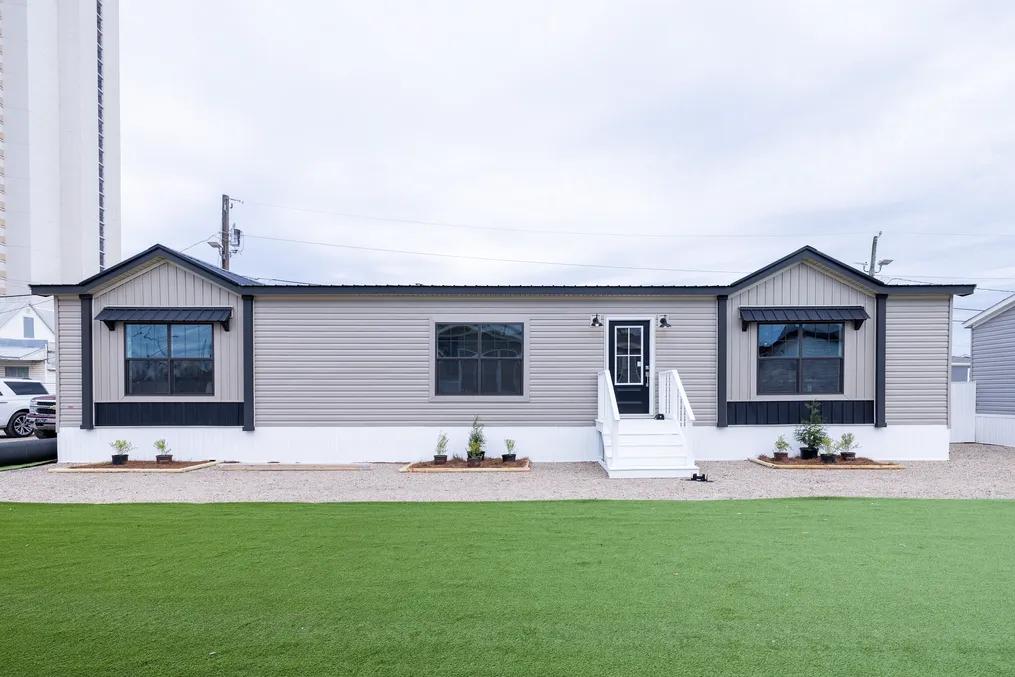 The THE ANNA FAE Exterior. This Manufactured Mobile Home features 3 bedrooms and 2 baths.