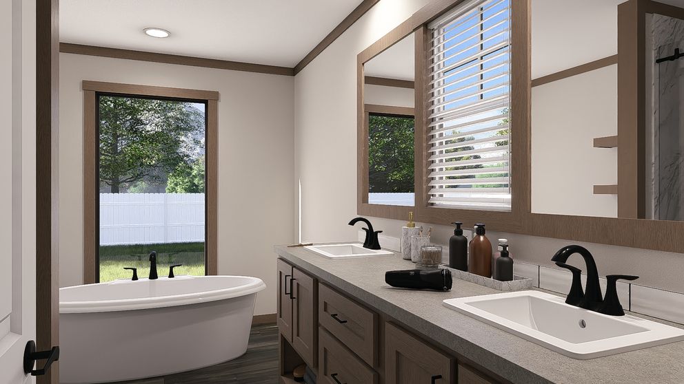 The EMILIE Exterior. This Manufactured Mobile Home features 3 bedrooms and 2 baths.