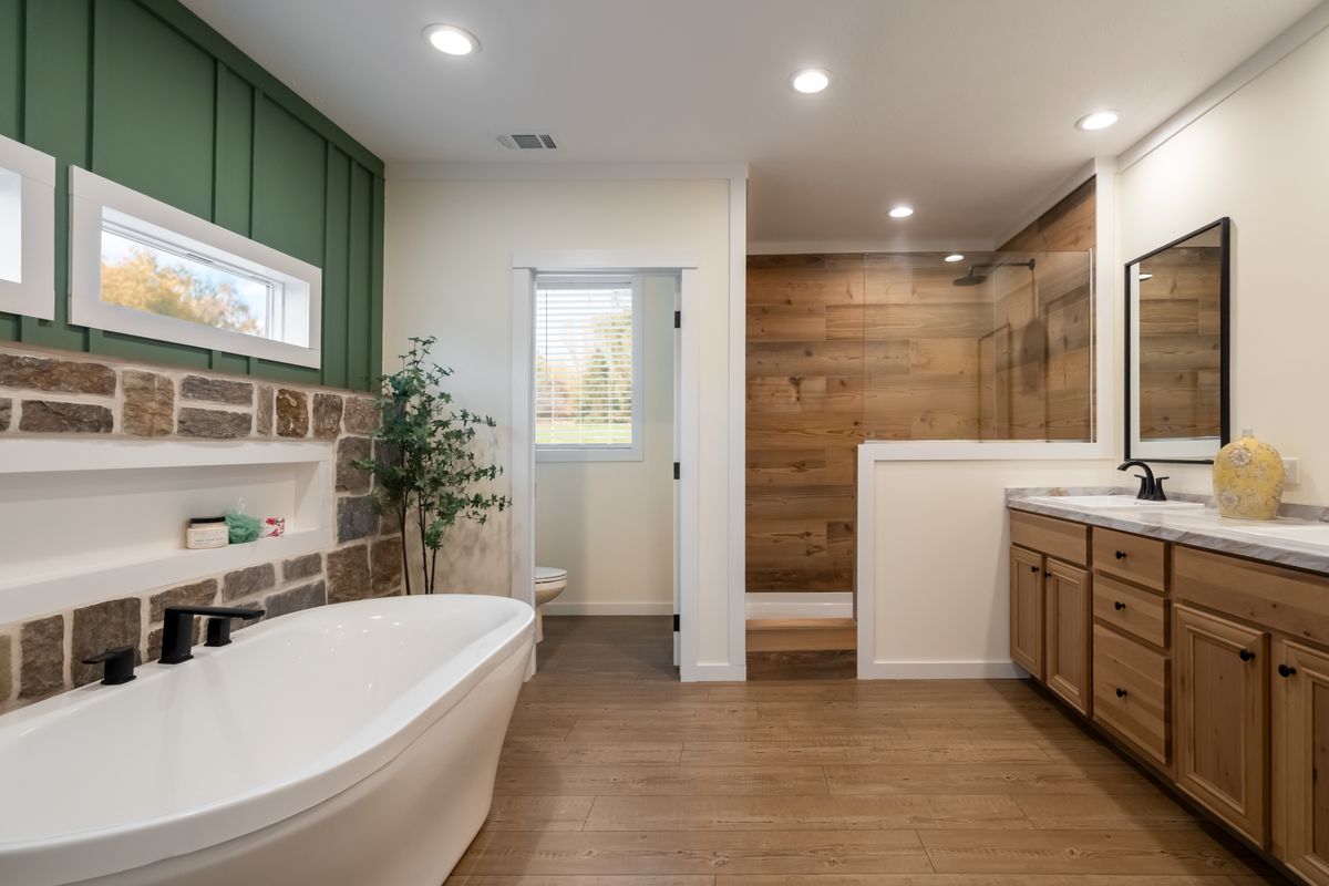 The THE ROCKING CHAIR Exterior. This Manufactured Mobile Home features 3 bedrooms and 2 baths.