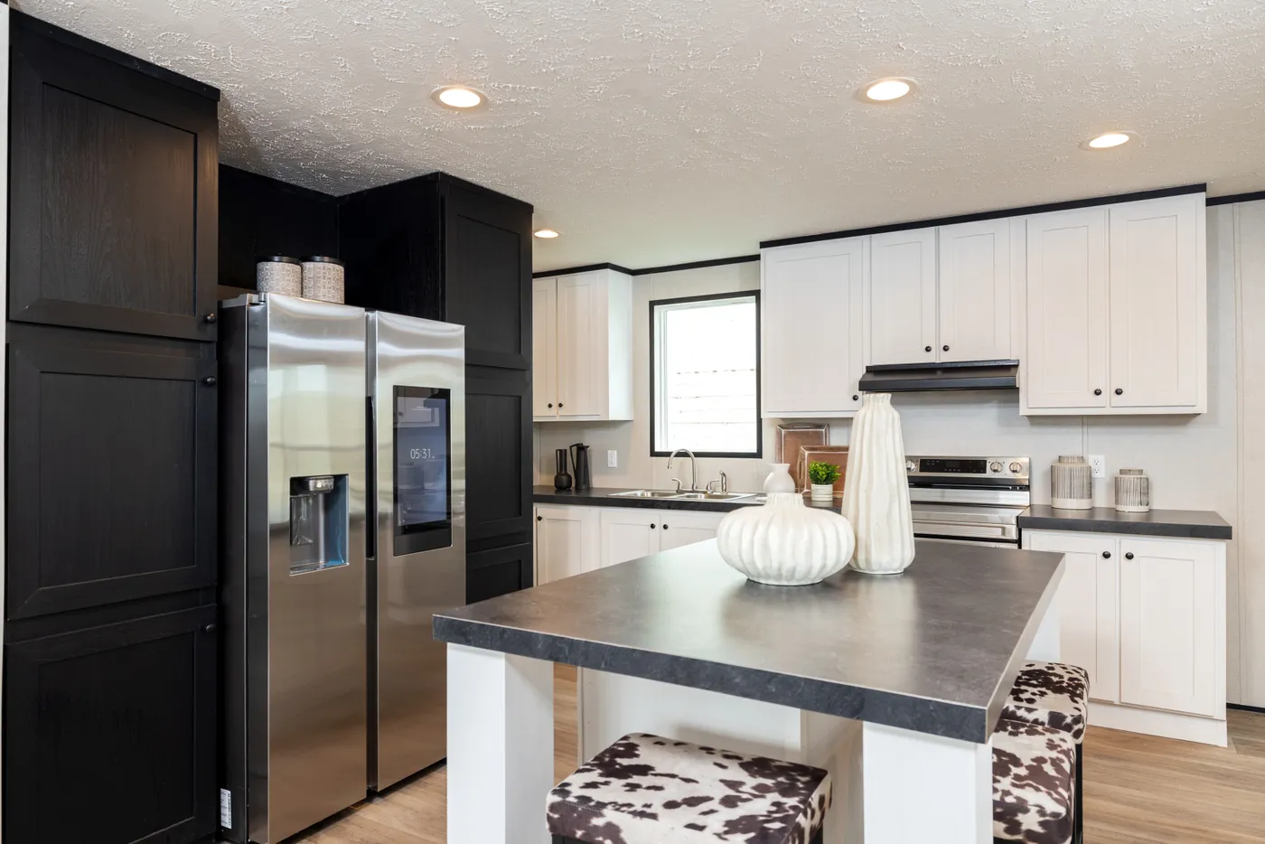 The PLATINUM ANNIVERSARY Exterior. This Manufactured Mobile Home features 3 bedrooms and 2 baths.