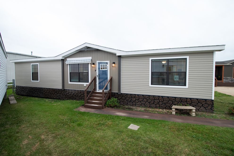 The LIZZIE Exterior. This Manufactured Mobile Home features 3 bedrooms and 2 baths.
