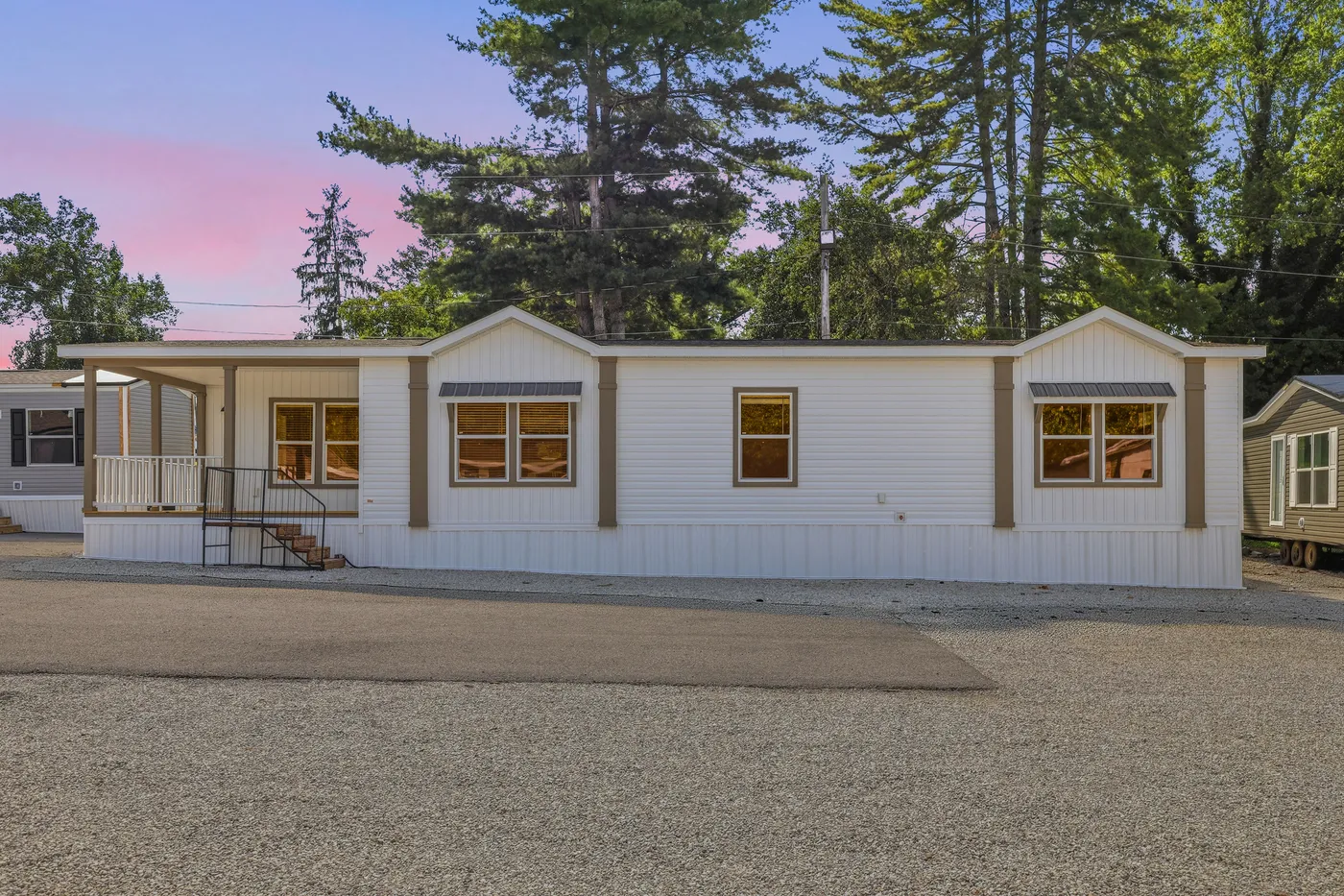 The SOUTHERN CHARM Exterior. This Manufactured Mobile Home features 3 bedrooms and 2 baths.