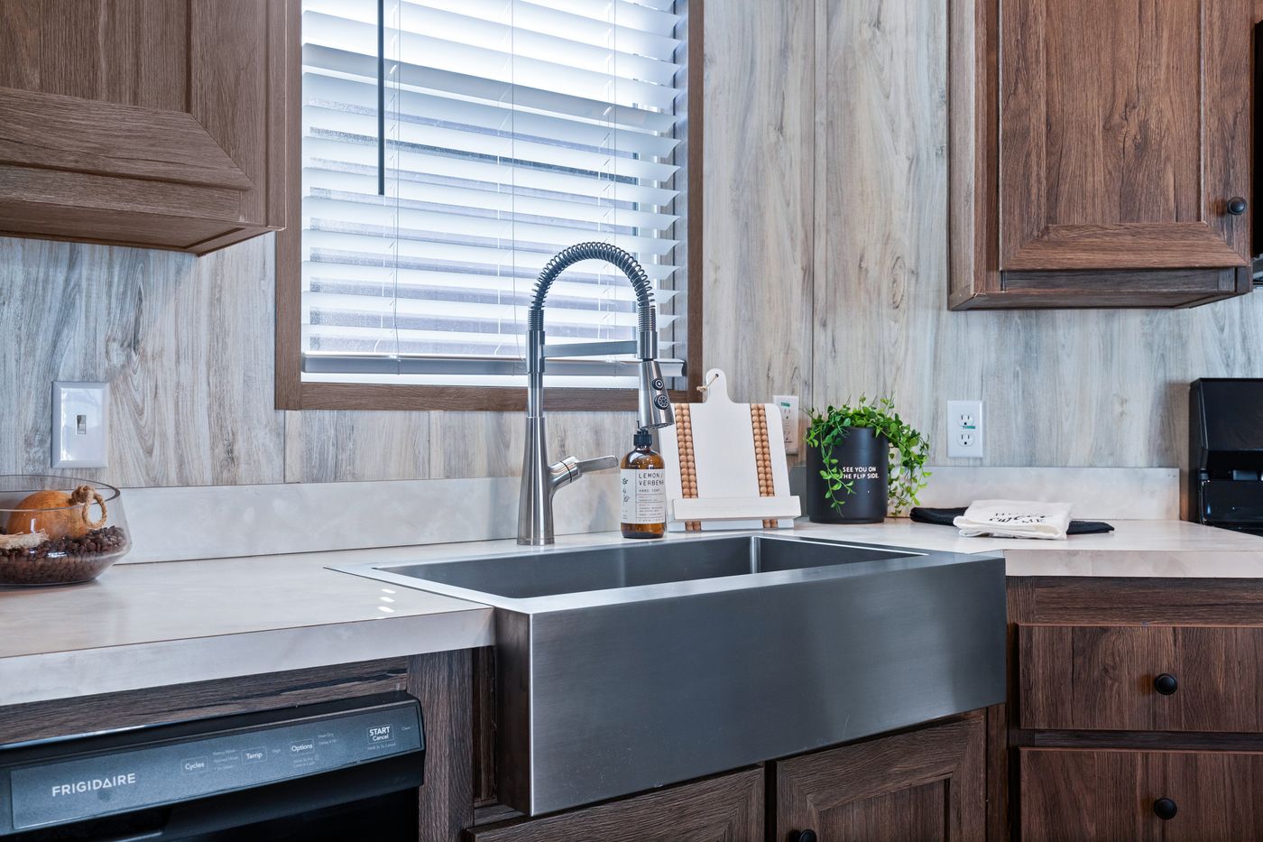 The ANNIVERSARY 16763F Kitchen. This Manufactured Mobile Home features 3 bedrooms and 2 baths.