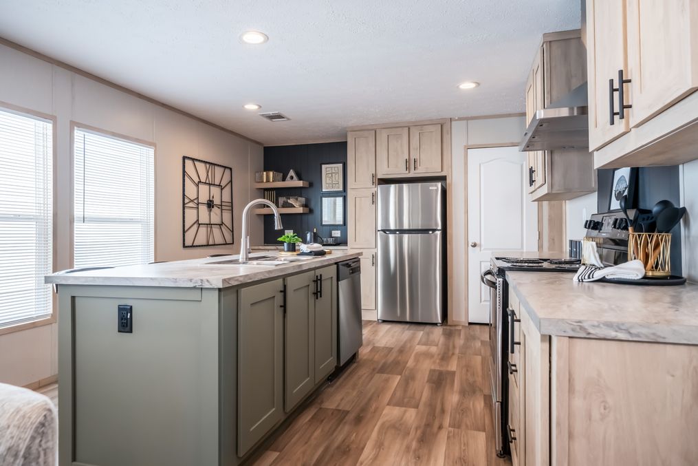 The RAINIER Exterior. This Manufactured Mobile Home features 4 bedrooms and 3 baths.