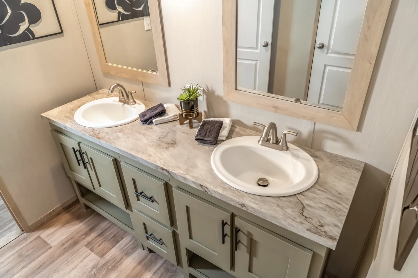 The RAINIER Exterior. This Manufactured Mobile Home features 4 bedrooms and 3 baths.