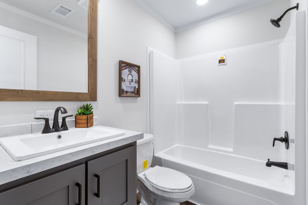 The LEXI Exterior. This Manufactured Mobile Home features 3 bedrooms and 2 baths.