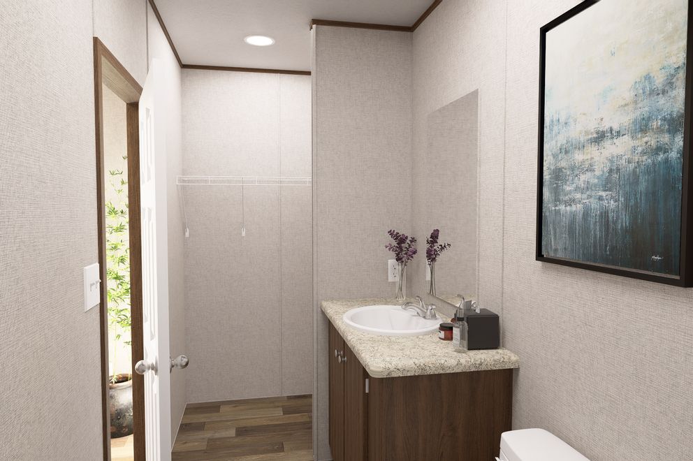 The CYPRESS Exterior. This Manufactured Mobile Home features 4 bedrooms and 2 baths.